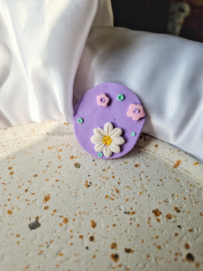 Magnet rond lilas.