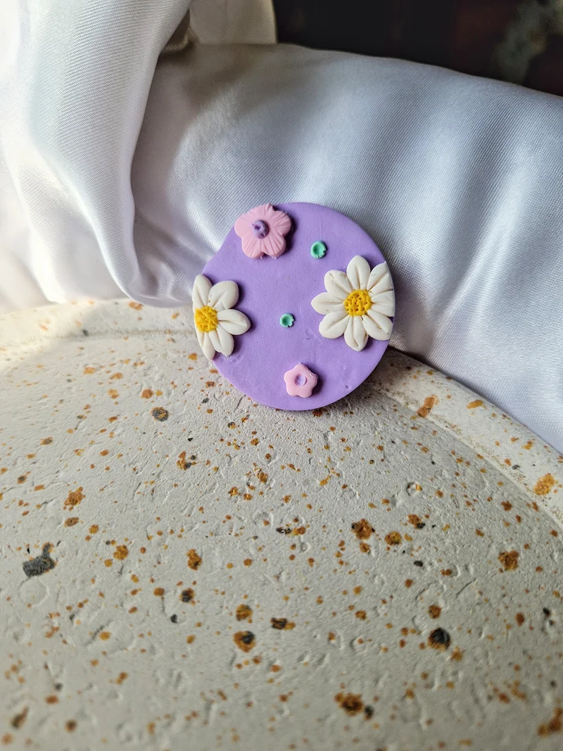 Magnet rond lilas.