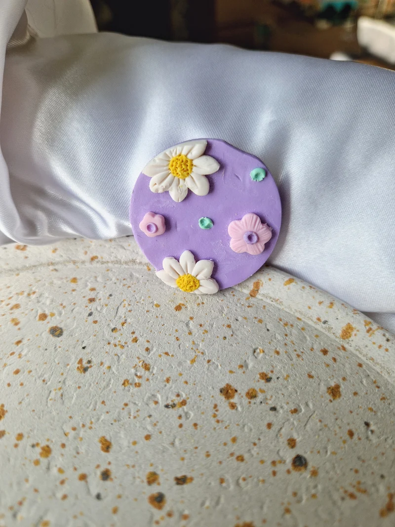Magnet rond lilas.