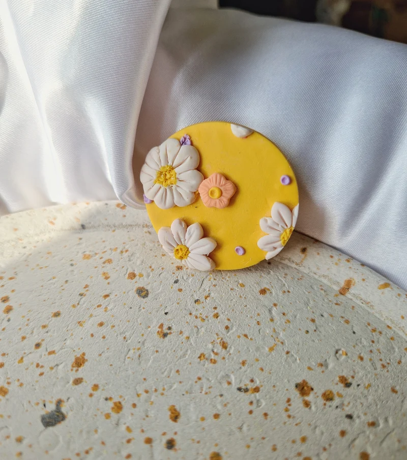 Magnet rond jaune.