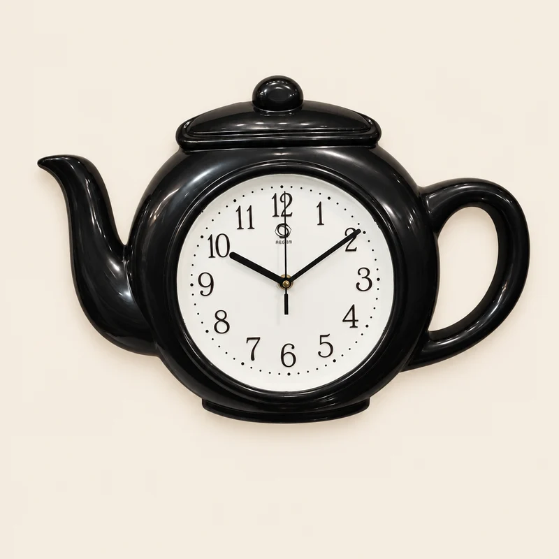 ساعة حائط على شكل إبريق شاي 42×30 سم