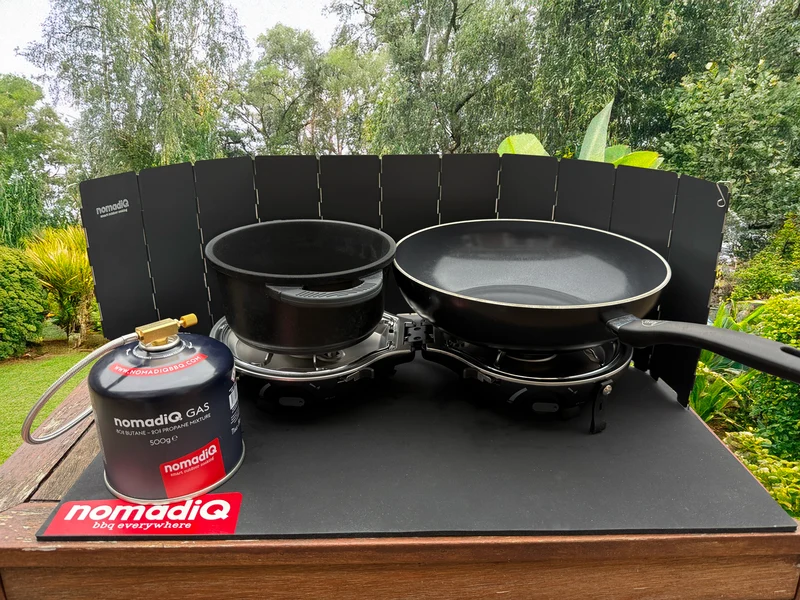 NomadiQ windscherm compact en stabiel voor buiten koken