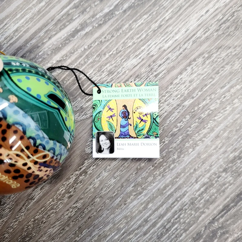 "Strong Earth Woman" Glass Ornament artwork by Métis Artist Leah Dorion