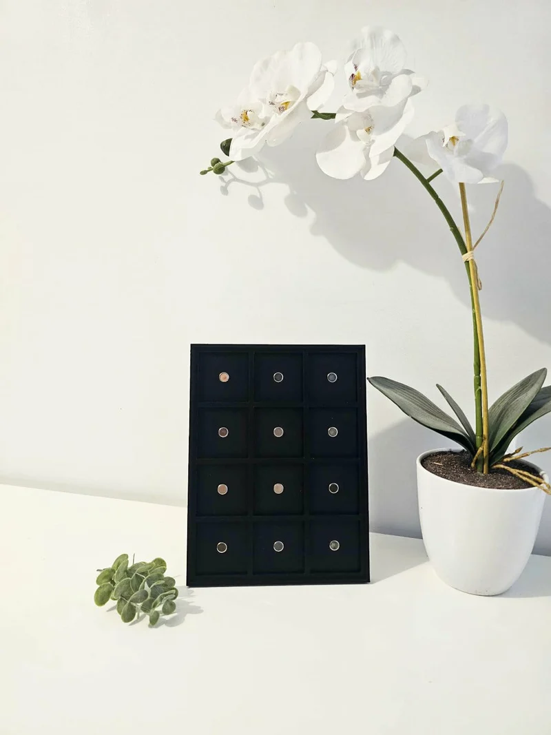 Cadre magnétique noir et 12 aimants 2x2
