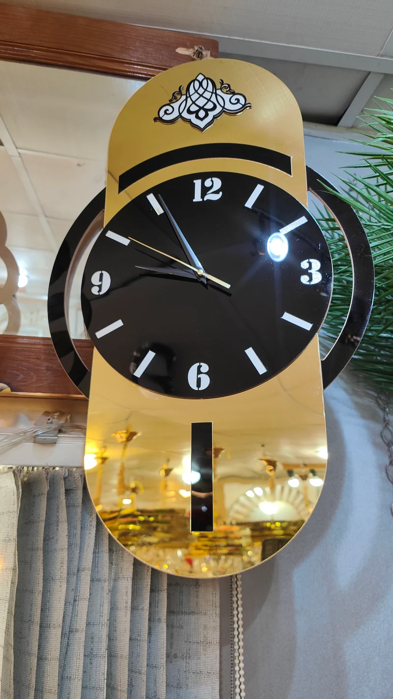 ساعة حائط MDF – 60×35 سم – تصميمين